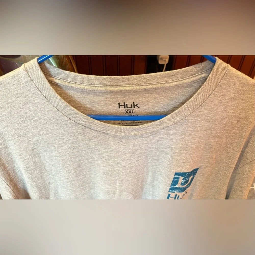 Huk men’s Outer Banks Angler t-shirt. Sharp blue print w/logos front/back/sleeve